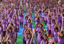 25,000 tribal students perform 108 Surya Namaskarams in 108 minutes in Vizag