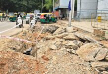 Pedestrians struggle as footpath remains in shambles in heart of Bengaluru